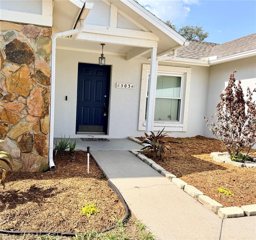 A spacious room features hardwood floors, a pool table, and a dining area — 503 RAPID FALLS DR, BRANDON, FL