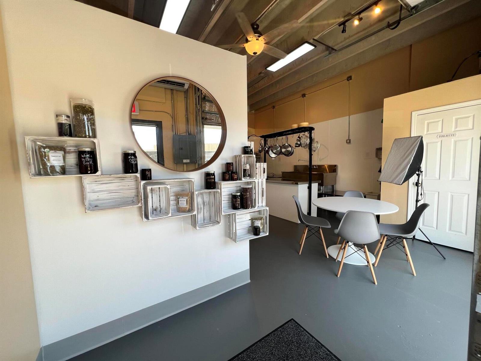 An industrial room with a grey floor, white walls, a sink, and two doorways — 1211 Old Okeechobee Road, West Palm Beach FL 33401, WEST PALM BEACH, FL