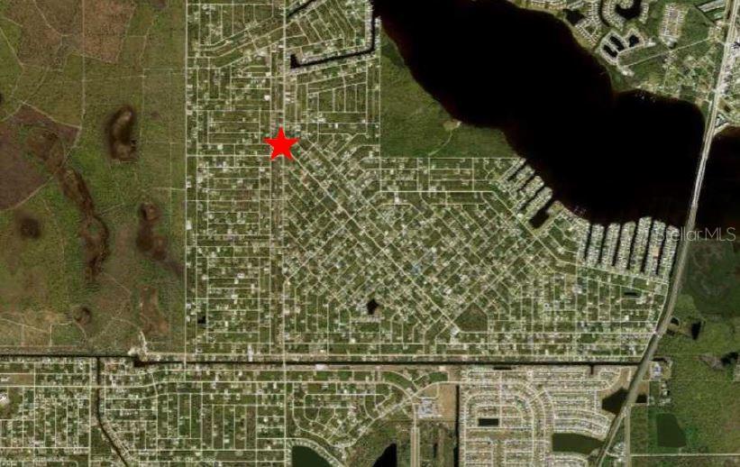 An aerial map view shows a residential neighborhood with a red star marking a location — 4499 GILLOT BOULEVARD, PORT CHARLOTTE, FL