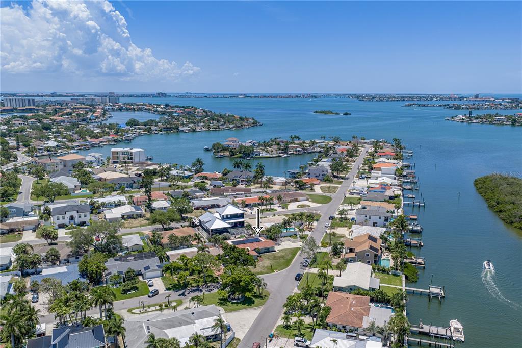 An aerial view shows a residential neighborhood with a house marked by an arrow — 6717 CARDINAL DRIVE S, ST PETERSBURG, FL