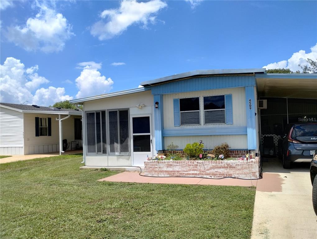 4509 AUTUMN PALM DRIVE
