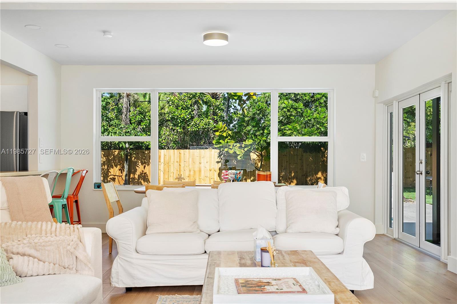 An aerial view shows a house with a pool and a large driveway — 10801 Peachtree Dr, Miami FL 33161, MIAMI, FL