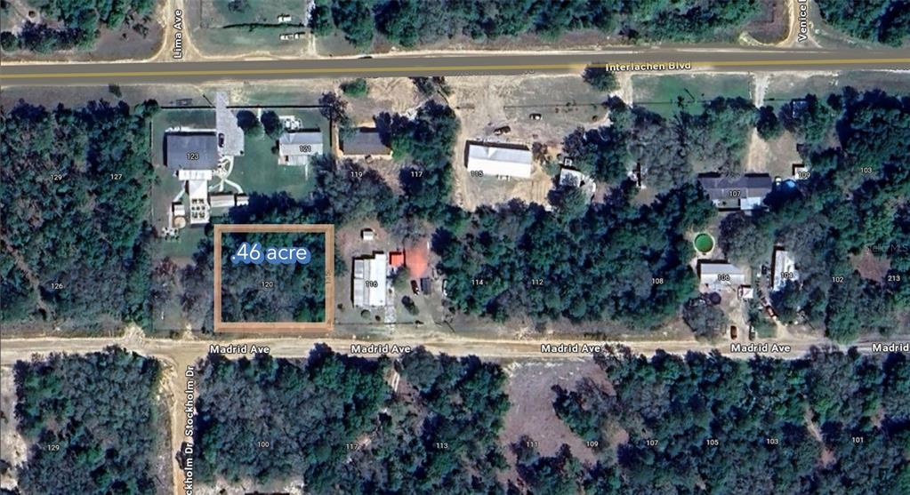 An aerial map view shows a highlighted rectangular plot of land along a dirt road — 120 MADRID AVENUE, INTERLACHEN, FL