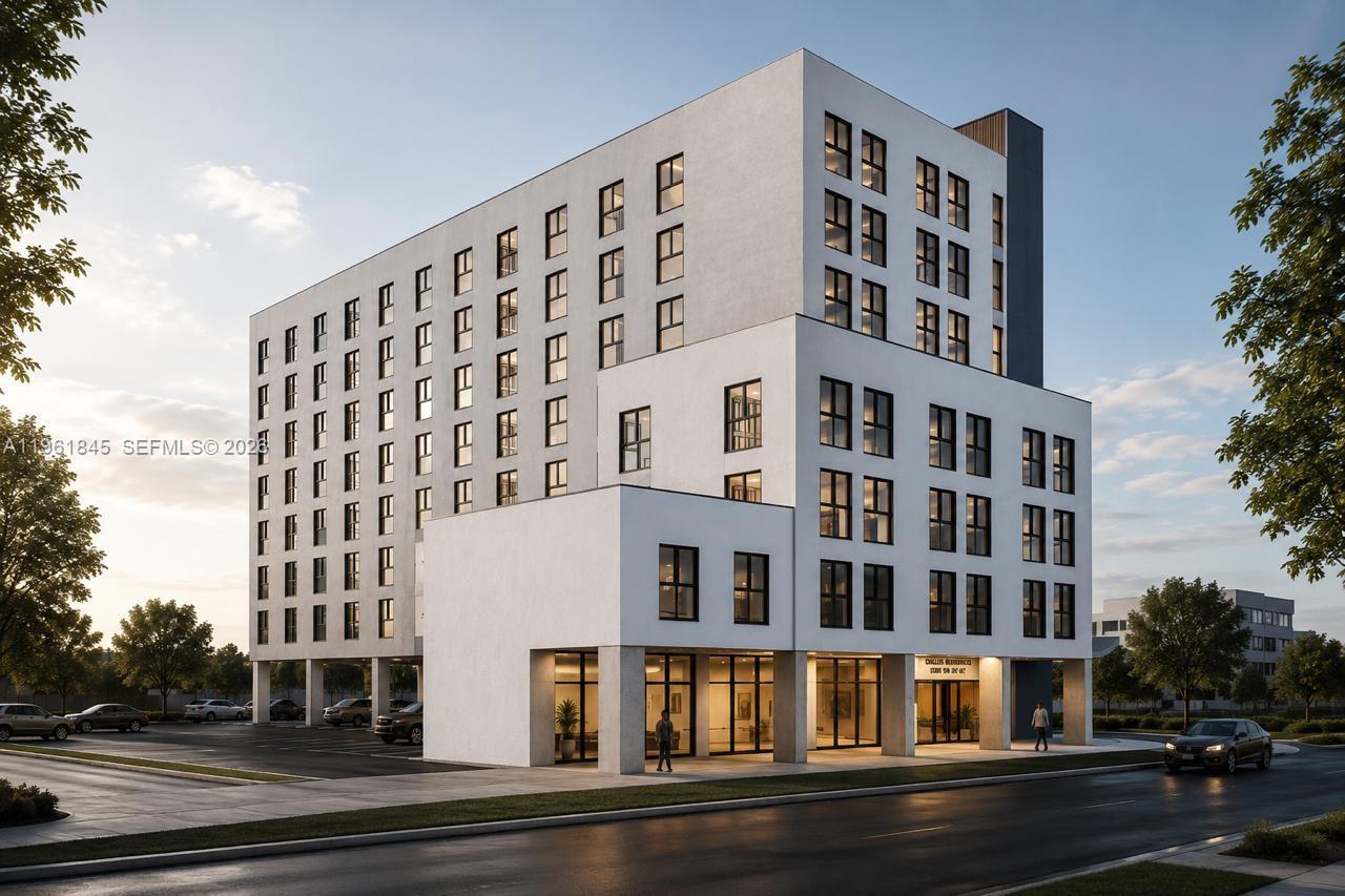 This is a digital rendering of a modern, multi-story white apartment building with ground-level parking — 0 216 St, Miami FL 33177, MIAMI, FL