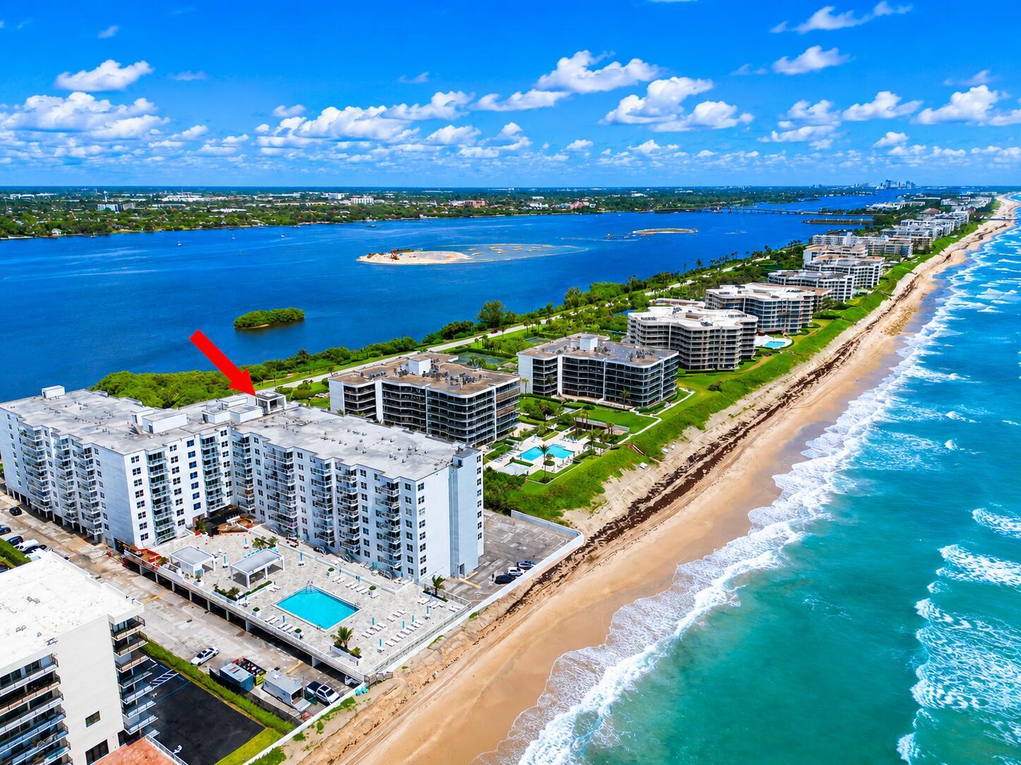 Aerial view of a beachfront condominium complex with a swimming pool and ocean access — 3450 S Ocean Boulevard # 6010, Palm Beach FL 33480, PALM BEACH, FL