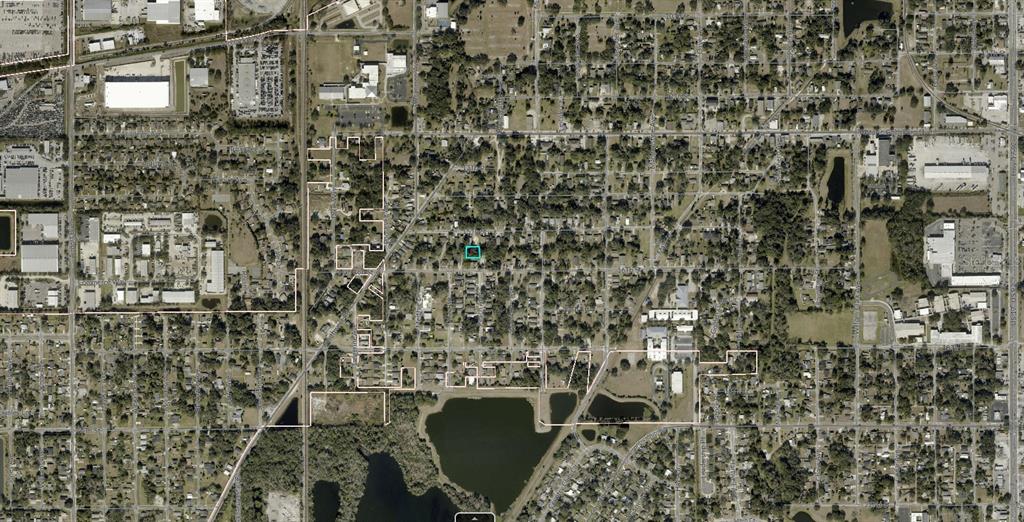 This is an aerial map view showing a highlighted property lot within a residential neighborhood — 34-19-30-5AK-0A00-0470 INACCESSIBLE TRACK, SANFORD, FL