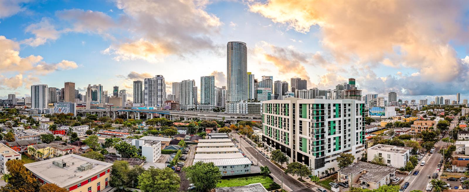 A panoramic view of the Miami skyline featuring high-rise buildings, highway overpasses, and residential neighborhoods — 450 SW 5th Street # 401, Miami FL 33130, MIAMI, FL