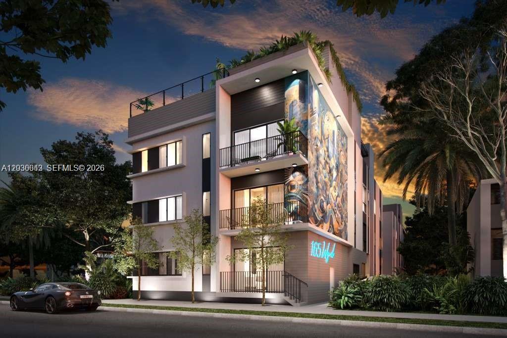 This is a digital rendering of a modern three-story apartment building with a mural — 3128 NW 3rd Ave, Miami FL 33127, MIAMI, FL
