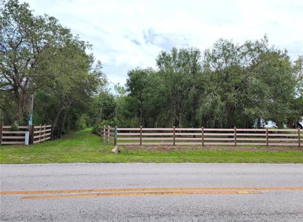 An aerial map shows a property parcel outlined in blue along Singletary Road — 36564 SINGLETARY ROAD, MYAKKA CITY, FL