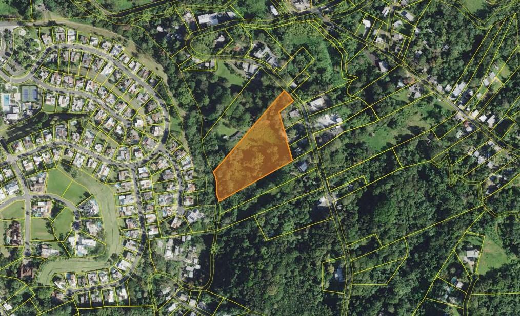 An aerial map view shows a highlighted vacant lot surrounded by trees and residential neighborhoods — PR 176 KM6.6 CUPEY ALTO, SAN JUAN, PR