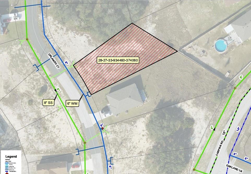 This is a map showing a highlighted parcel of land with nearby utility lines — 1411 ORLANDO COURT, KISSIMMEE, FL