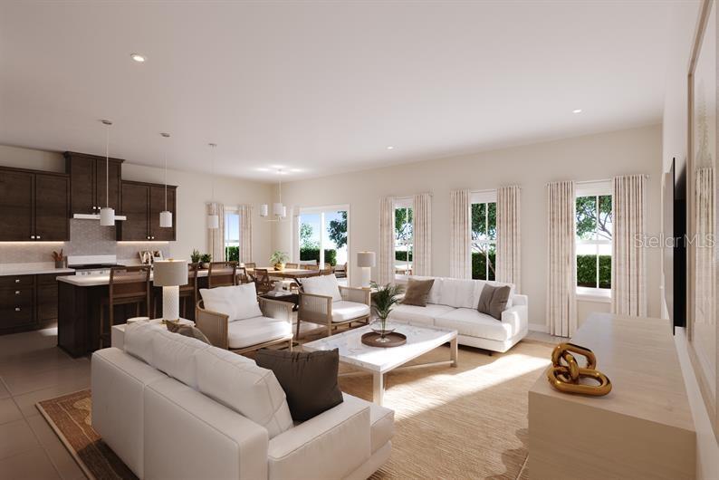 This rendering shows an open-concept kitchen and living area with dark cabinetry and white furniture — 6378 CEDAR LANDING CIRCLE, LEESBURG, FL