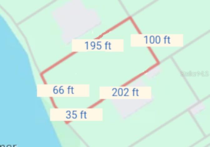 This is a map showing the property boundaries and dimensions of a waterfront lot — LARSON STREET, ENGLEWOOD, FL
