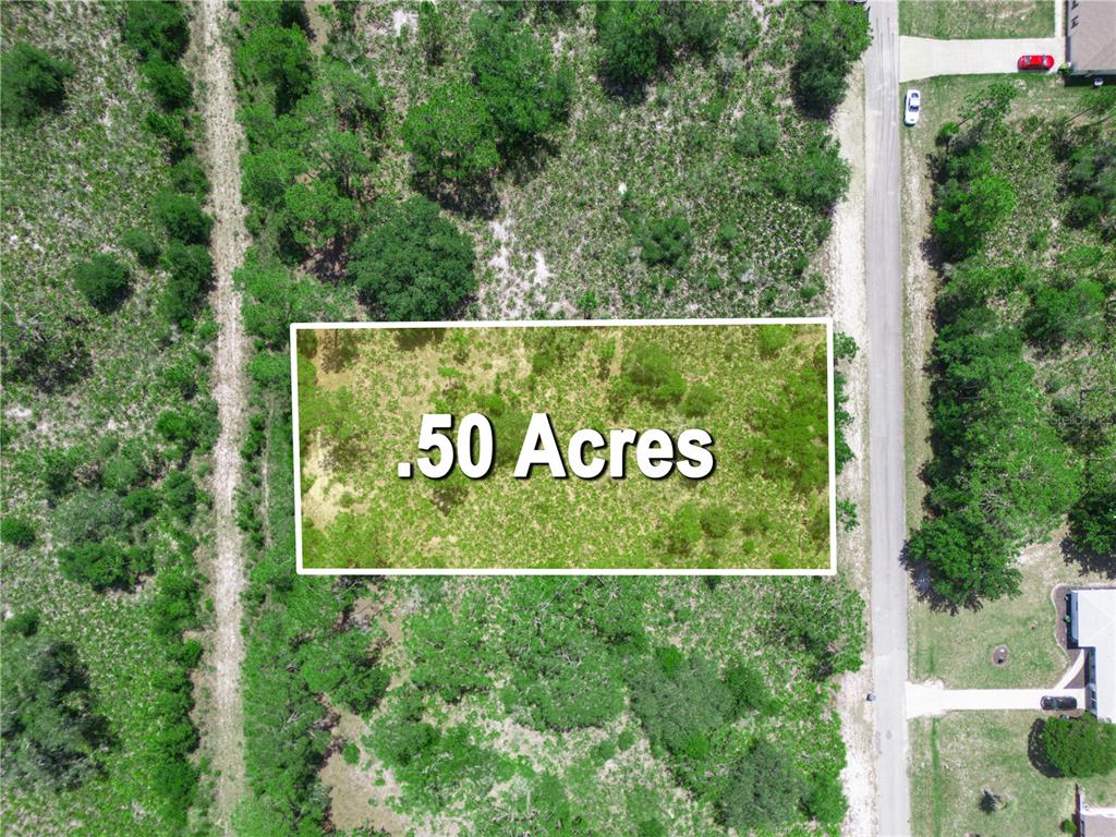 This aerial view shows a rectangular plot of land labeled .50 acres — 618 GARDENIA DRIVE, INDIAN LAKE ESTATES, FL