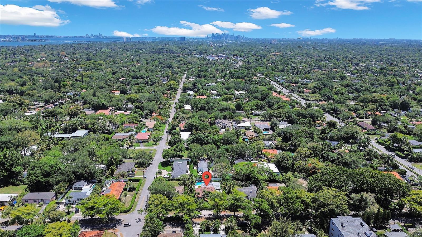 An aerial view shows a residential neighborhood with a red pin marking a specific house — 660 NE 121st St # 660, Biscayne Park FL 33161, BISCAYNE PARK, FL