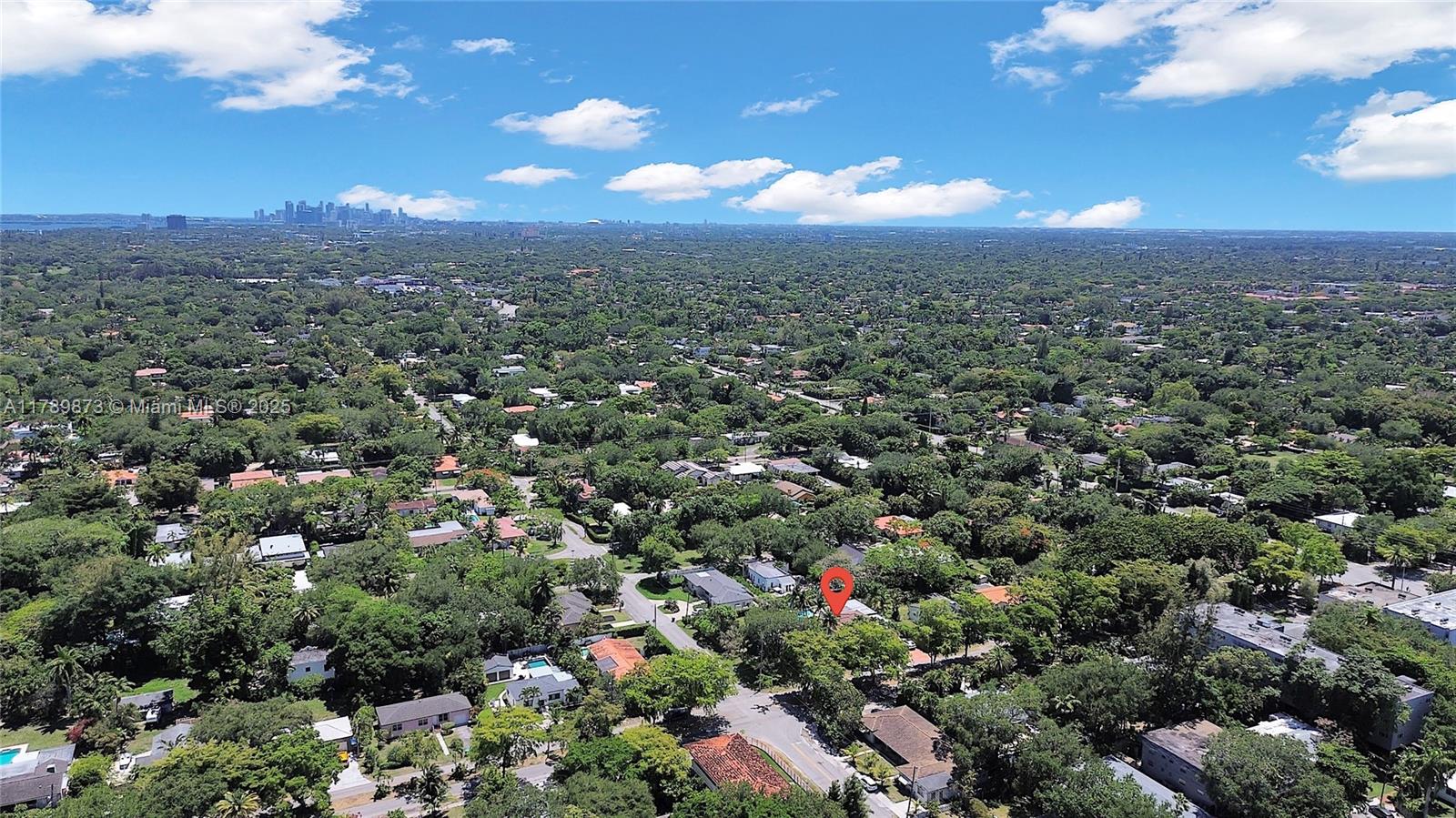 An aerial view shows a residential neighborhood with a red location pin over a house — 660 NE 121st St # 660, Biscayne Park FL 33161, BISCAYNE PARK, FL