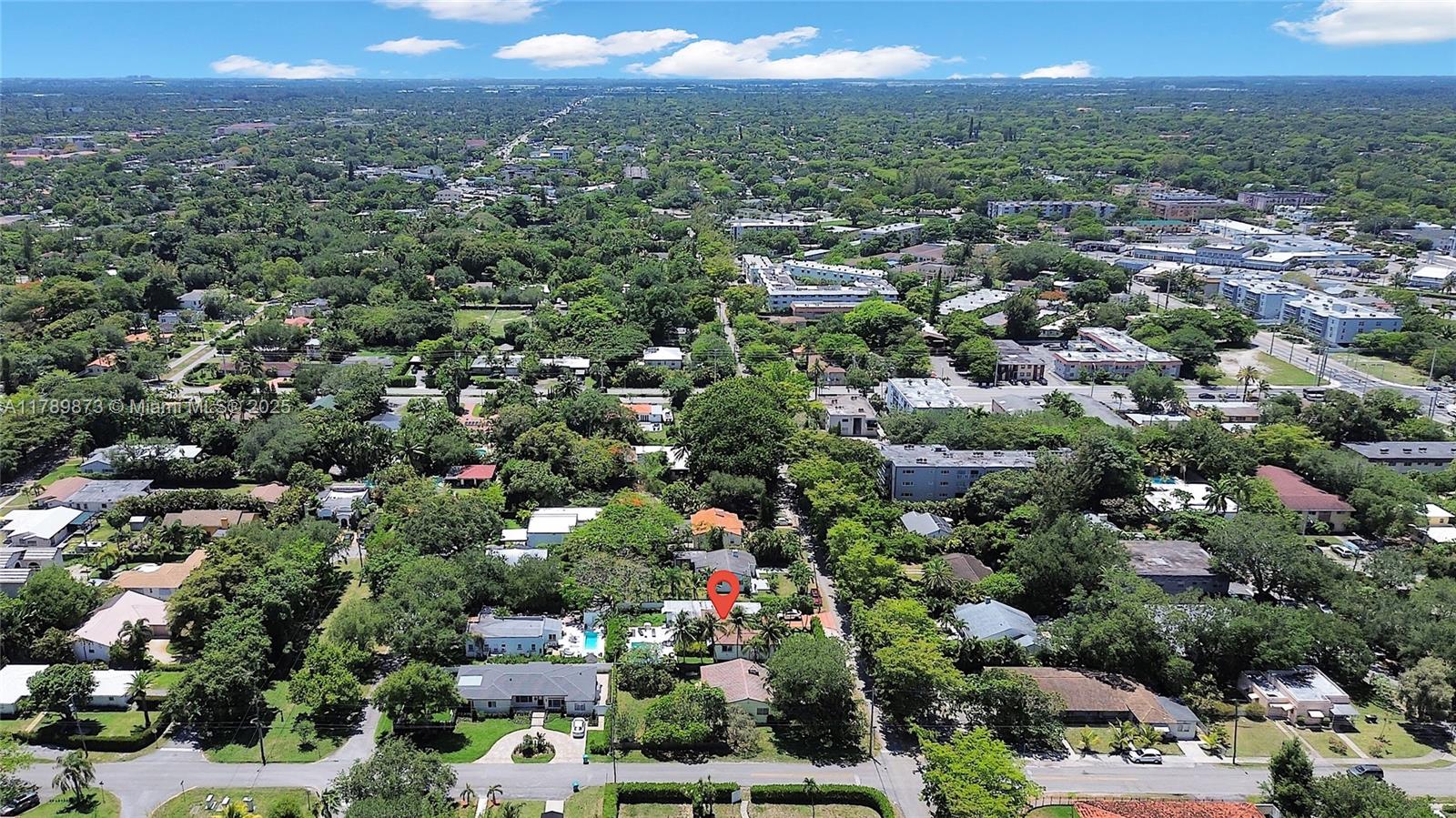An aerial view shows a residential neighborhood with a red location pin marking a house — 660 NE 121st St # 660, Biscayne Park FL 33161, BISCAYNE PARK, FL