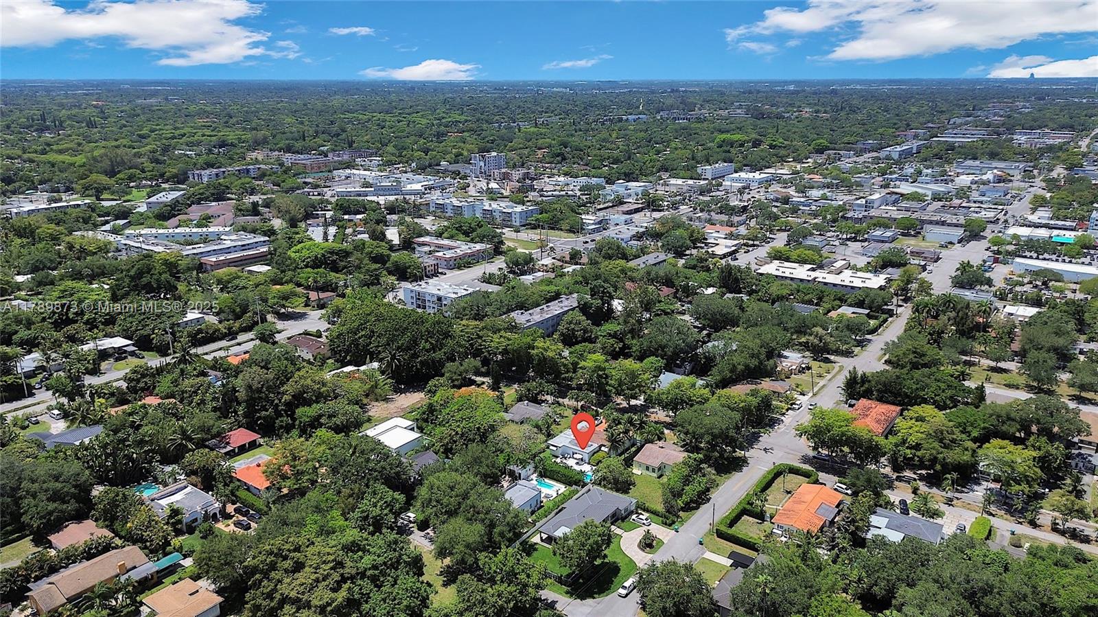 An aerial view shows a residential neighborhood with a red pin marking a house — 660 NE 121st St # 660, Biscayne Park FL 33161, BISCAYNE PARK, FL