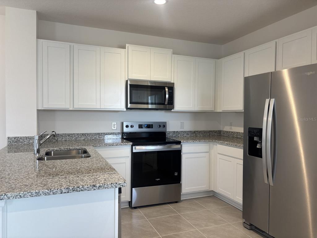 1438 ACORN MEADOW LOOP, EUSTIS, FL — photo 5 of 16