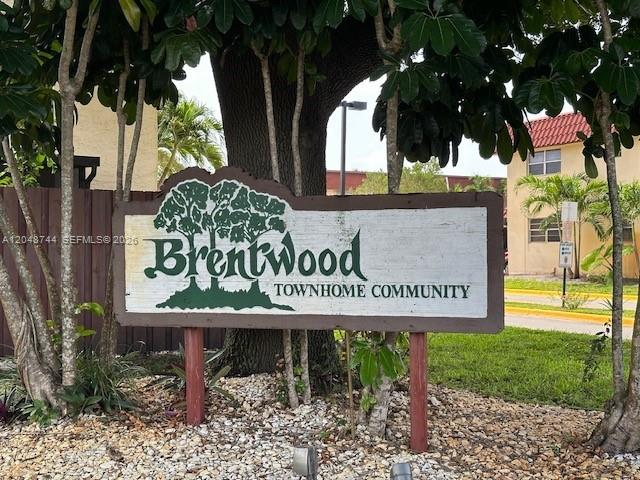 A wooden sign for the Brentwood Townhome Community stands in front of trees and buildings — 6631 SW 41st Pl # 43, Davie FL 33314, DAVIE, FL