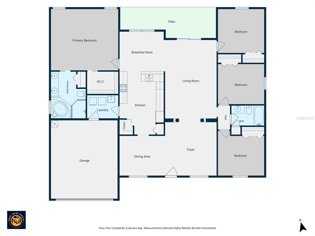 This is a floor plan of a single-story house with a garage and patio — 12155 PEREGRINE FALCON AVENUE, WEEKI WACHEE, FL