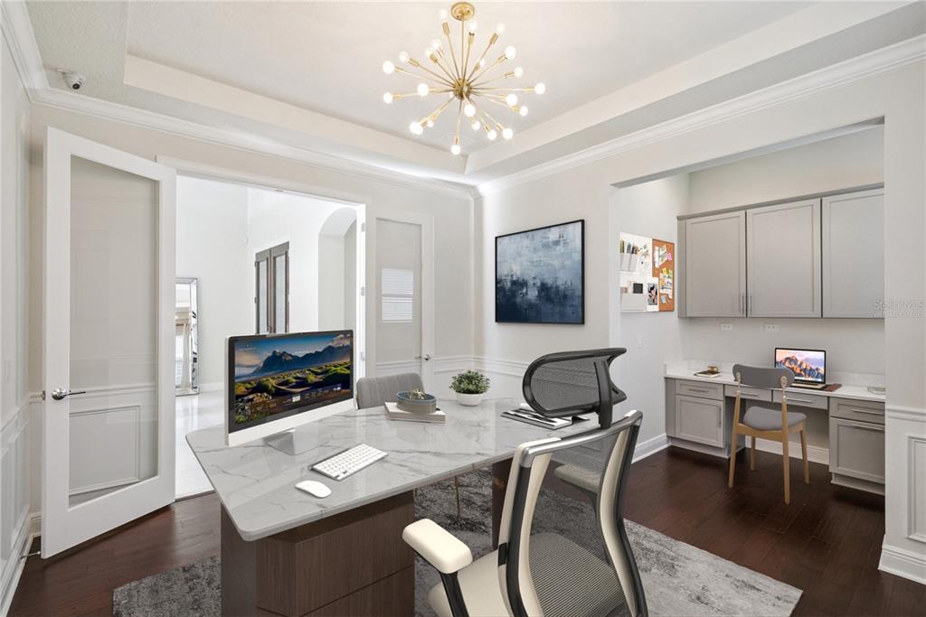 A home office features a marble-topped desk, a modern chandelier, and a built-in workstation — 8591 ADALINA PLACE, ORLANDO, FL