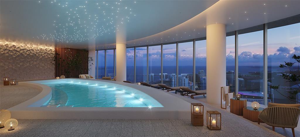 This rendering shows an indoor pool area with floor-to-ceiling windows overlooking a city skyline — 300 Biscayne Blvd Way # 2508, Miami FL 33131, MIAMI, FL