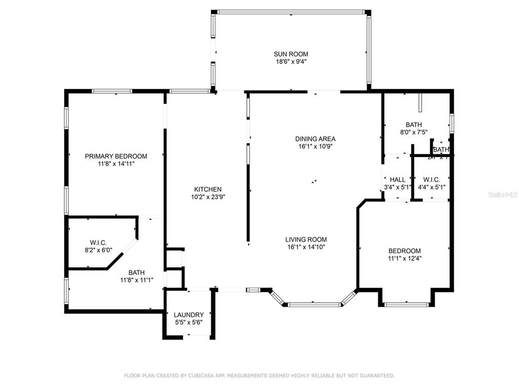 This is a floor plan showing a home with two bedrooms, a kitchen, and sunroom — 11218 FOUNTAIN LAKE BOULEVARD, LEESBURG, FL