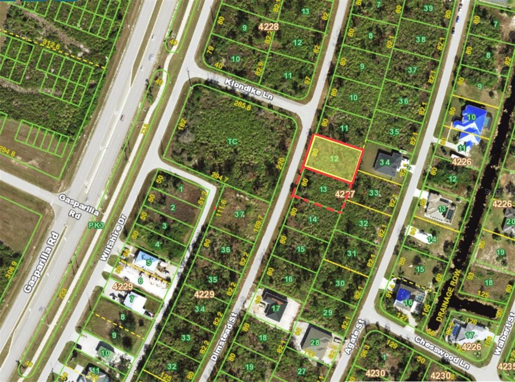 This is a satellite map showing residential lots and streets in a suburban neighborhood — 8218 DIMSTEAD STREET, PORT CHARLOTTE, FL