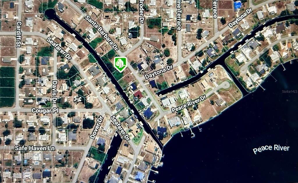 This is an aerial map showing residential streets and a canal near a river — 3273 SANTA BARBARA DRIVE, PUNTA GORDA, FL