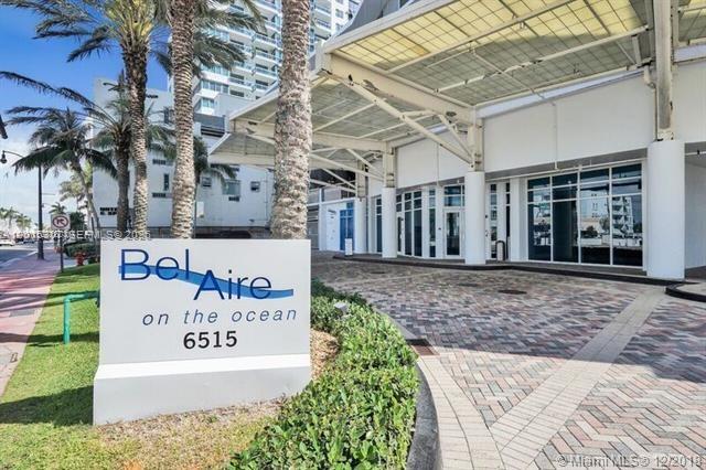 A sign for Bel Aire on the Ocean stands before a building with a covered entrance — 6515 Collins Ave # 1107, Miami Beach FL 33141, MIAMI BEACH, FL