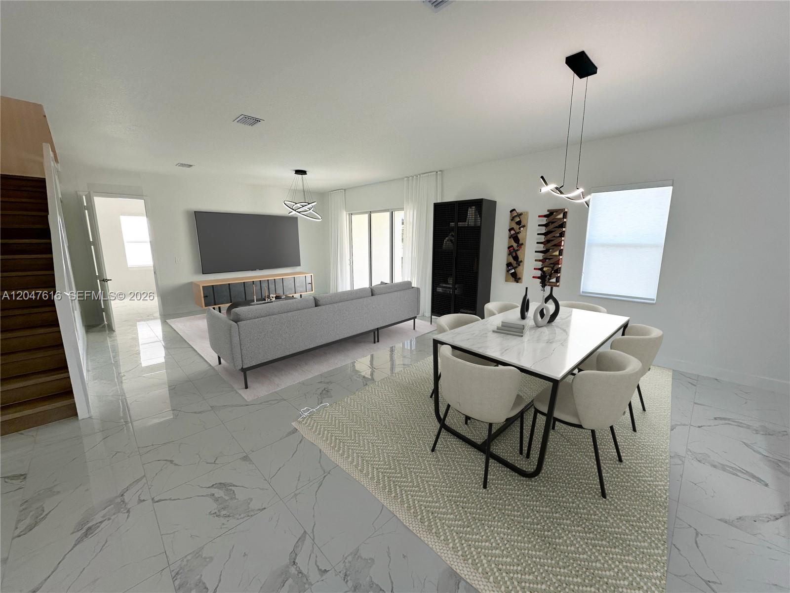 An open-concept living and dining area features marble tile floors and modern light fixtures — 4255 SW 123rd Ter, Davie FL 33330, DAVIE, FL