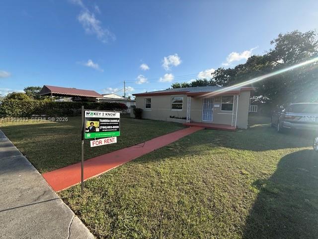 A single-story house with a red walkway and a for-rent sign in the front yard — 14620 Monroe St # x, Miami FL 33176, MIAMI, FL