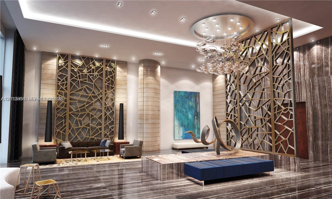 This rendering shows a modern lobby with marble floors, decorative gold screens, and a sculptural chandelier — NORTH MIAMI BEACH, FL