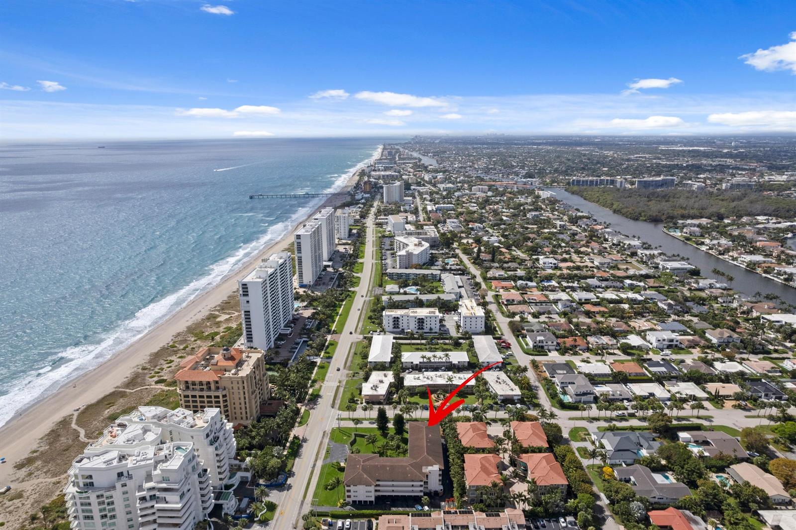 An aerial view shows a multi-story residential building highlighted by a red arrow — 2501 S Ocean Boulevard # 3010, Boca Raton FL 33432, BOCA RATON, FL