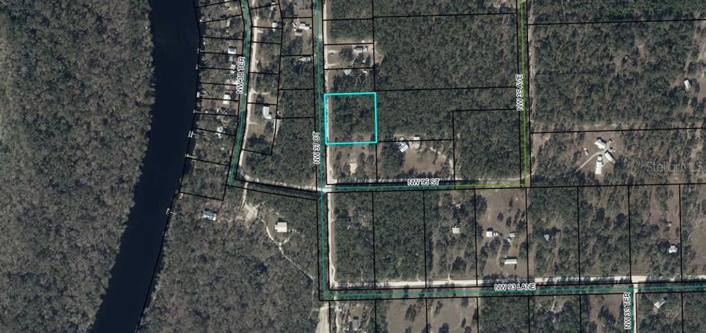 This is an aerial map view showing a highlighted vacant lot in a wooded area — NW 37 COURT, BRANFORD, FL