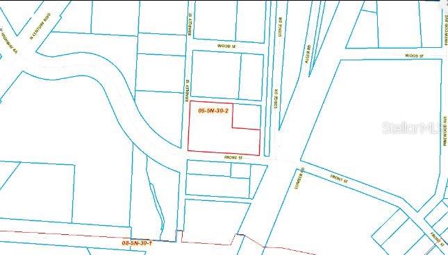 This is a property map showing a parcel outlined in red near Front Street — 120 FRONT STREET, CENTURY, FL