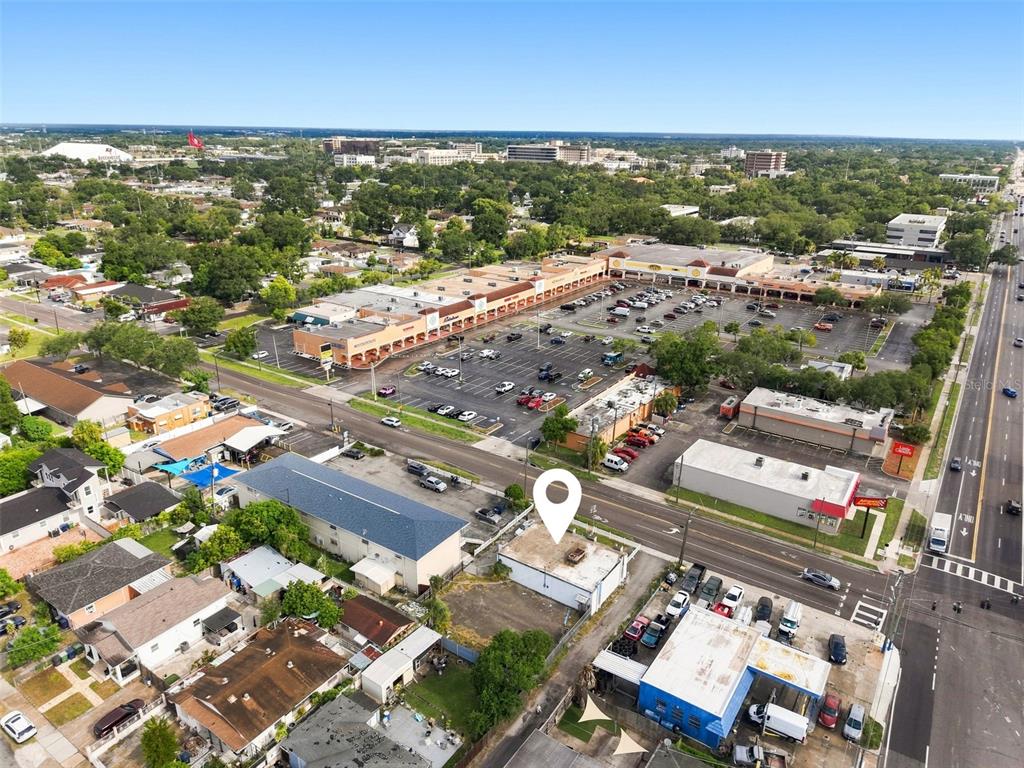 An aerial view shows a commercial building with a map pin in a suburban area — 2508 W TAMPA BAY BOULEVARD, TAMPA, FL