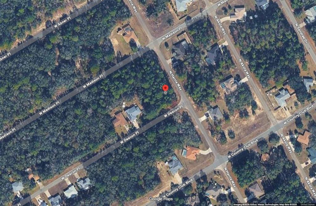 This is a satellite map view of a vacant residential lot in a wooded neighborhood — 721 W DEACON PLACE, CITRUS SPRINGS, FL