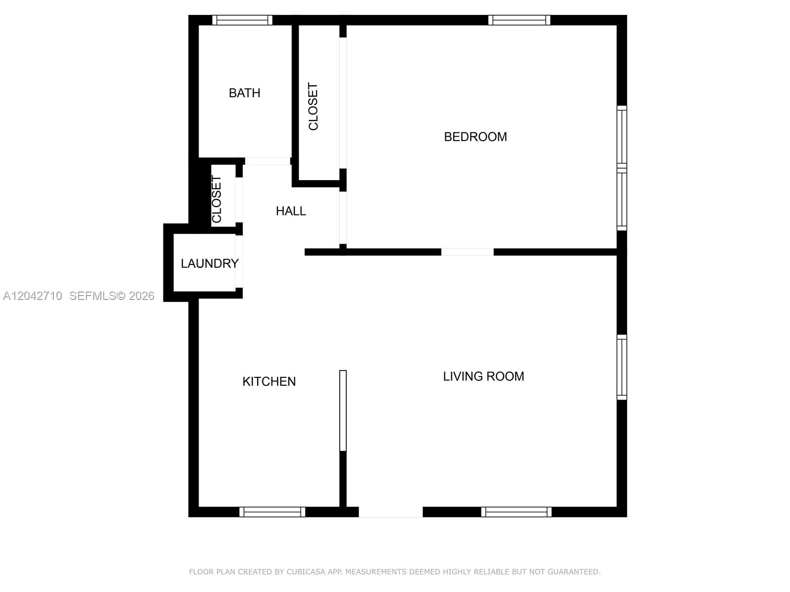 This is a floor plan of a one-bedroom apartment with a kitchen, living room, and laundry — 962 NW 6th St # 1, Miami FL 33136, MIAMI, FL