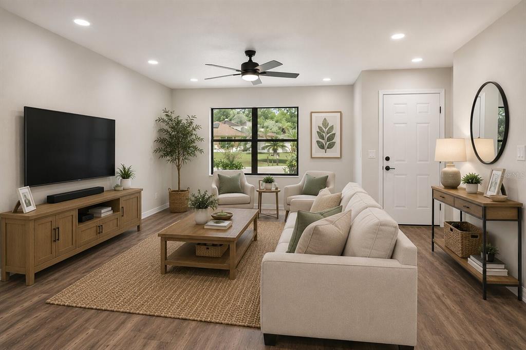 This is a digital rendering of a living room with light wood furniture and neutral decor — 575 LAKE MCCOY DRIVE, APOPKA, FL