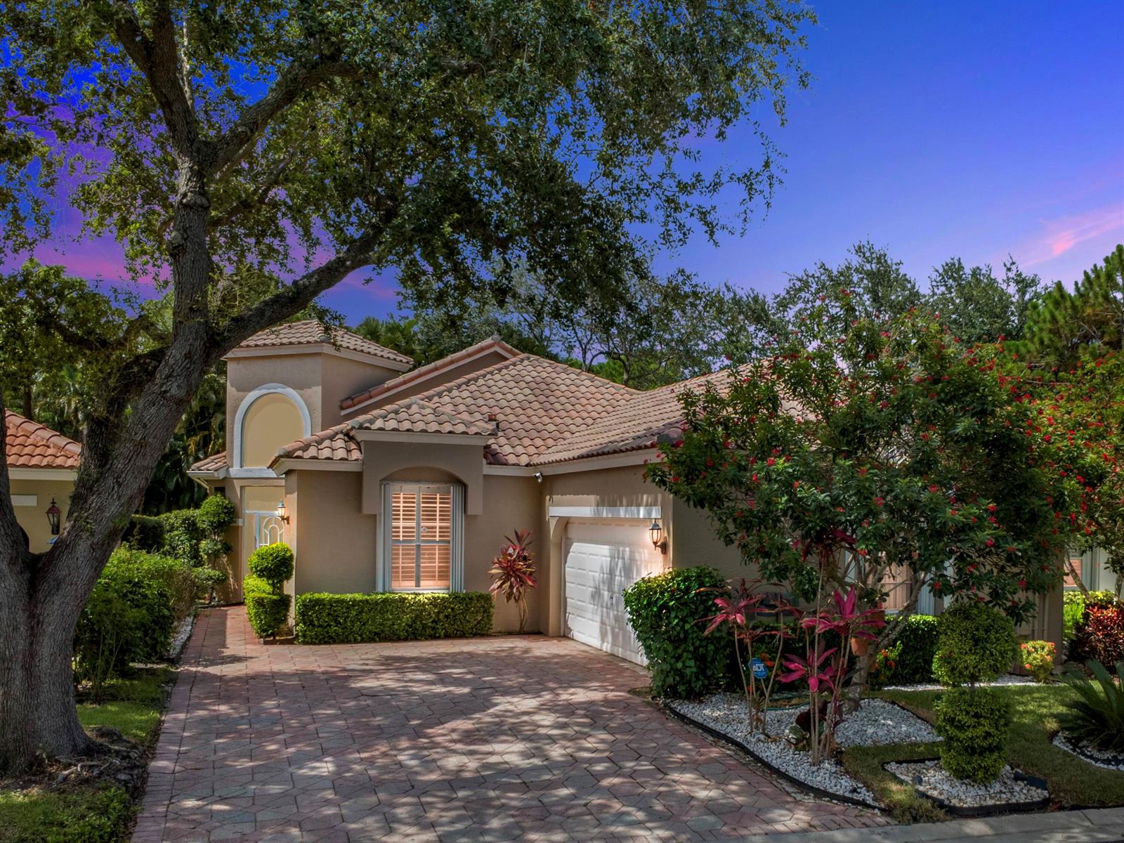 A single-story stucco house with a tile roof, paved driveway, and mature landscaping — 5159 Brookview Drive, Boynton Beach FL 33437, BOYNTON BEACH, FL