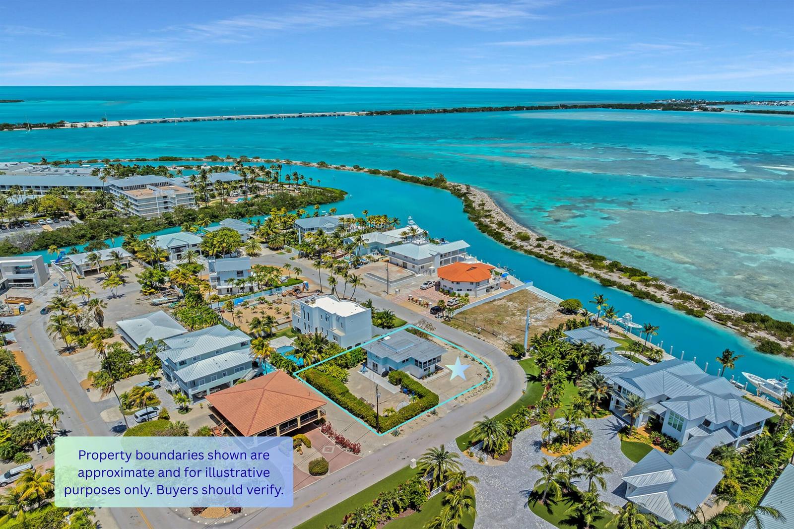 An aerial view shows a coastal house with a highlighted property boundary near the ocean — 309 Jasmine Street, FL 33050, FL