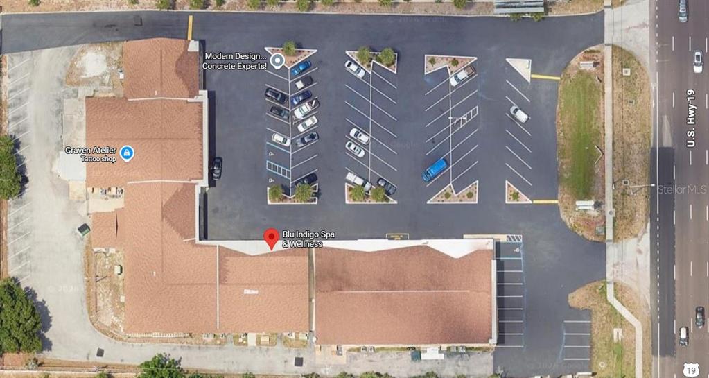 This is an aerial map view of a commercial building with a parking lot — 39920 US HIGHWAY 19 N UNIT 39920, TARPON SPRINGS, FL
