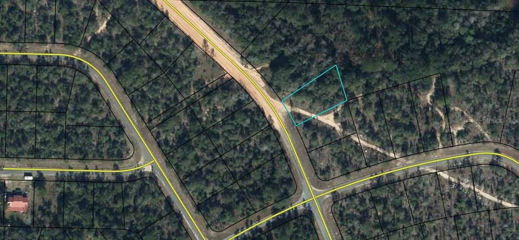 This is an aerial map showing a vacant, wooded lot outlined in blue — Lot 2 Unit 6 Blk 346 HAGAR AVENUE, CHIPLEY, FL
