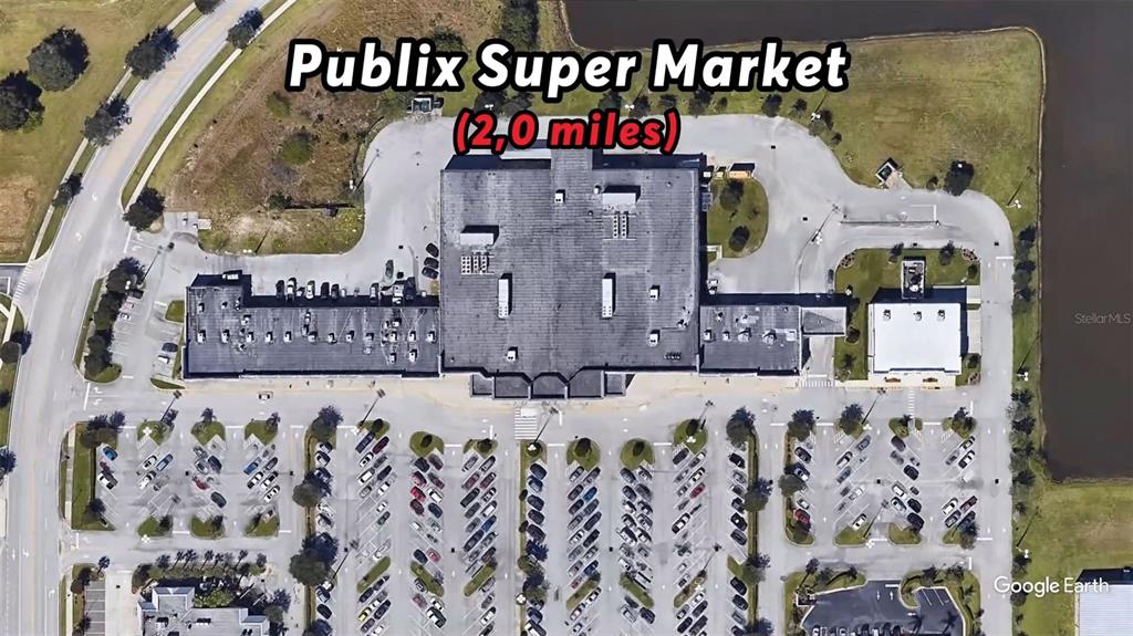 This is an aerial map view of a shopping center parking lot and building — 188 HAINES ROAD SW, PALM BAY, FL