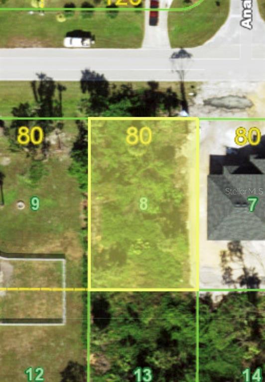 This is an aerial map view of a rectangular vacant residential lot highlighted in yellow — 12037 EISENHOWER DRIVE, PORT CHARLOTTE, FL