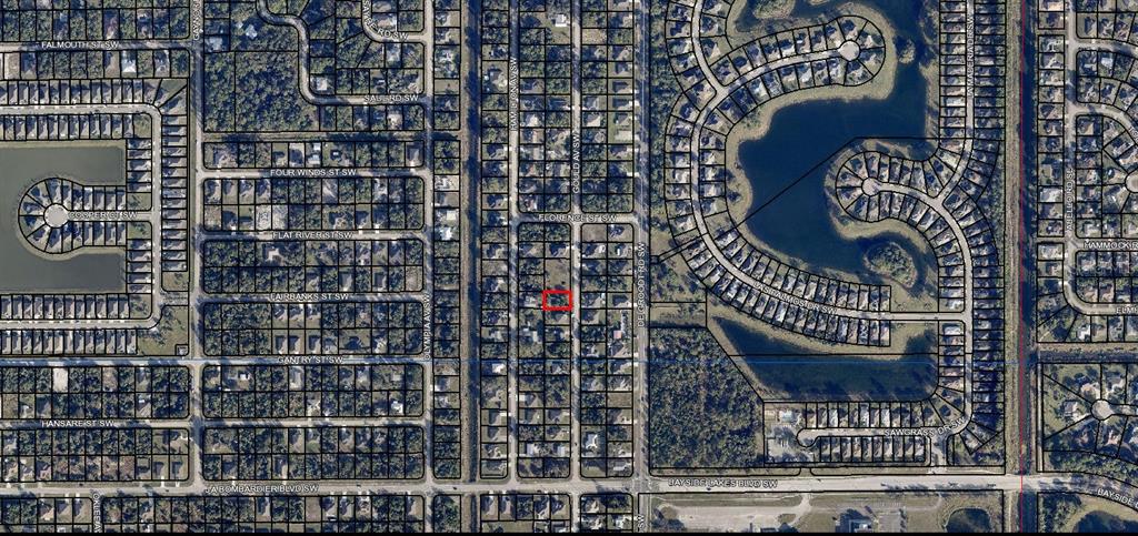 This is an aerial map view of a residential neighborhood with a highlighted property lot — 1756 GOULD AVENUE SW, PALM BAY, FL