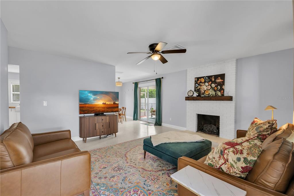 This is a floor plan of a single-story house featuring three bedrooms and a carport — 10509 ORANGE GROVE DRIVE, TAMPA, FL