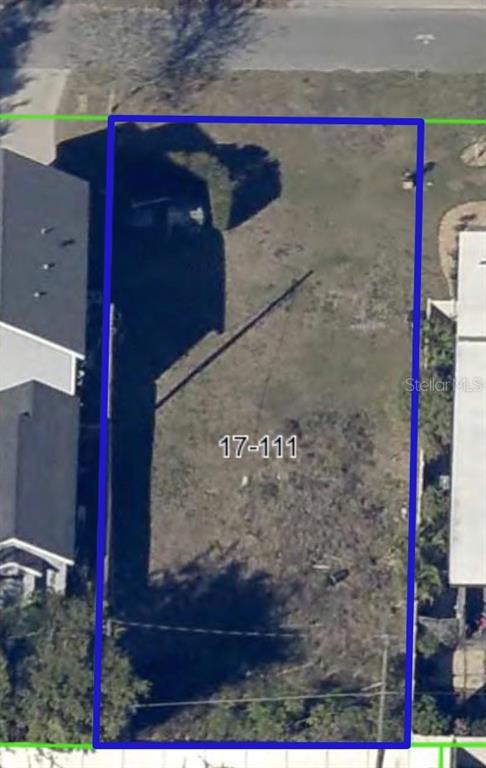This is an aerial view of a vacant rectangular residential lot outlined in blue — 4330 RIXEY STREET, ORLANDO, FL